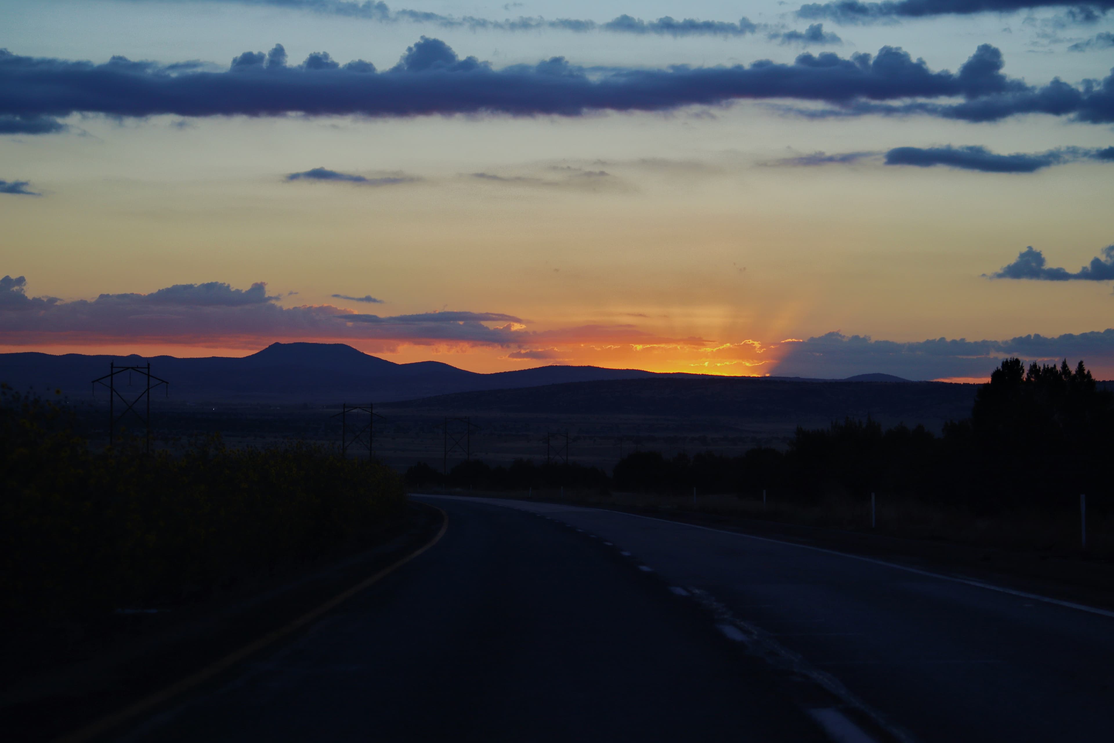A desert road outside Tucson at golden hour